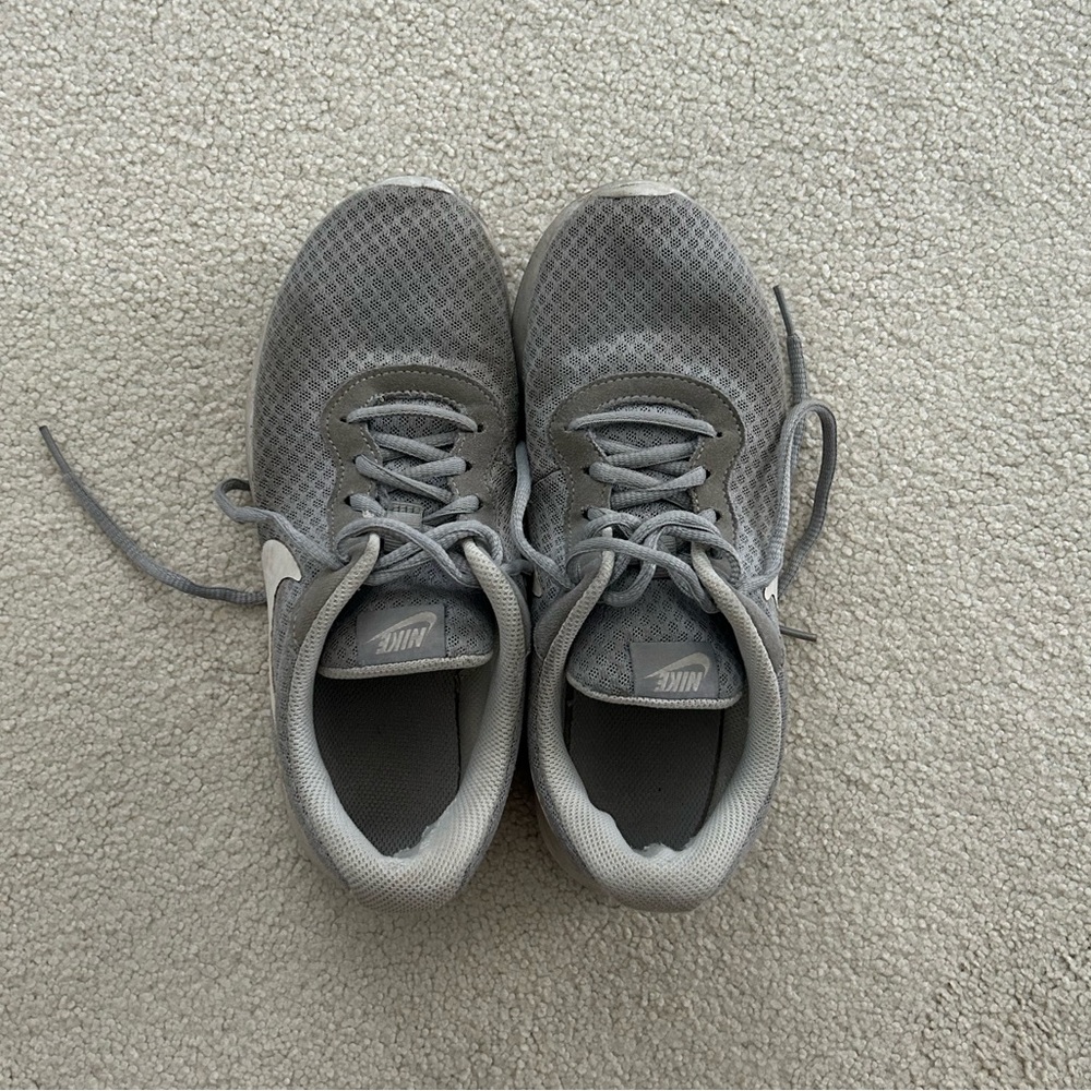 Well worn ladies sneakers